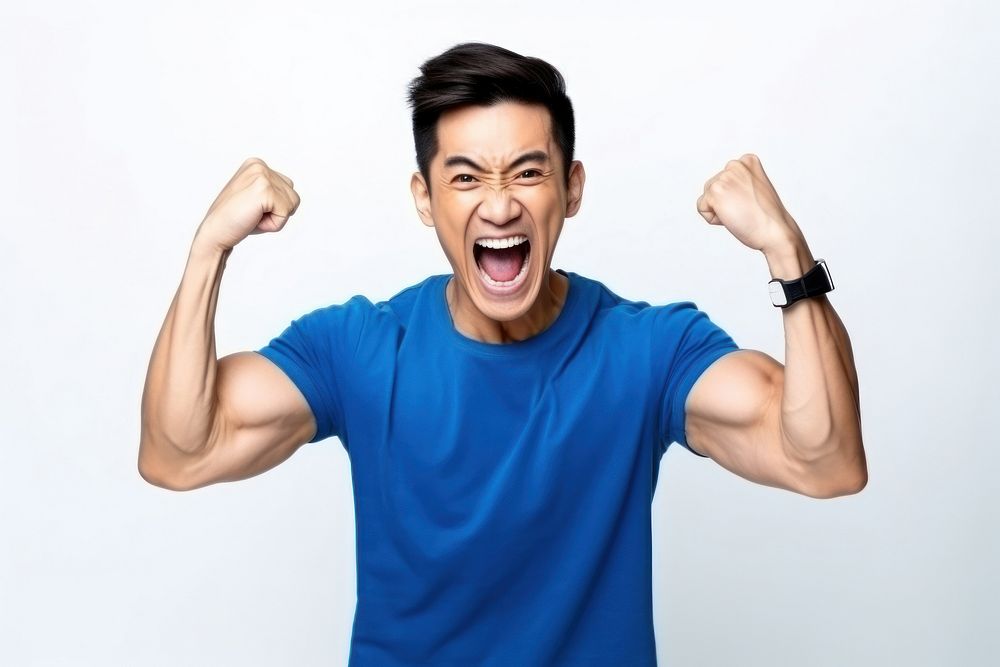 Smiling handsome young asian man shouting smiling blue. AI generated Image by rawpixel.