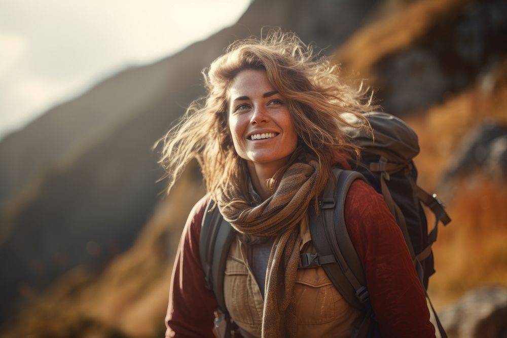 Warm-heart adult woman on adventure trail in mountain backpack outdoors hiking. AI generated Image by rawpixel.