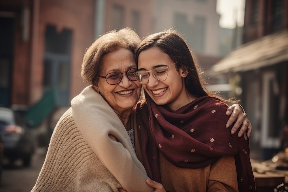 Smiling Pakistani daughter portrait smiling hugging. AI generated Image by rawpixel.