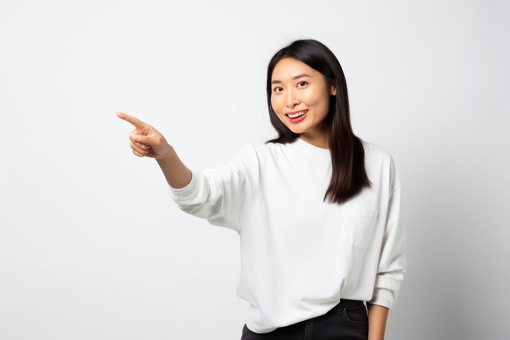 Young asian woman pointing finger adult. AI generated Image by rawpixel.