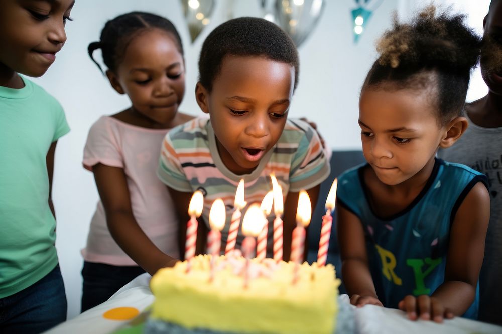 Black South African children candle party cake. AI generated Image by rawpixel.