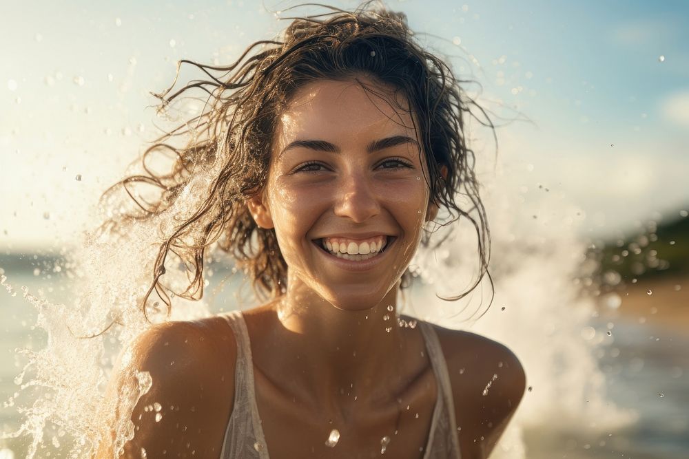 Woman playing water at a beach smile laughing portrait. AI generated Image by rawpixel.