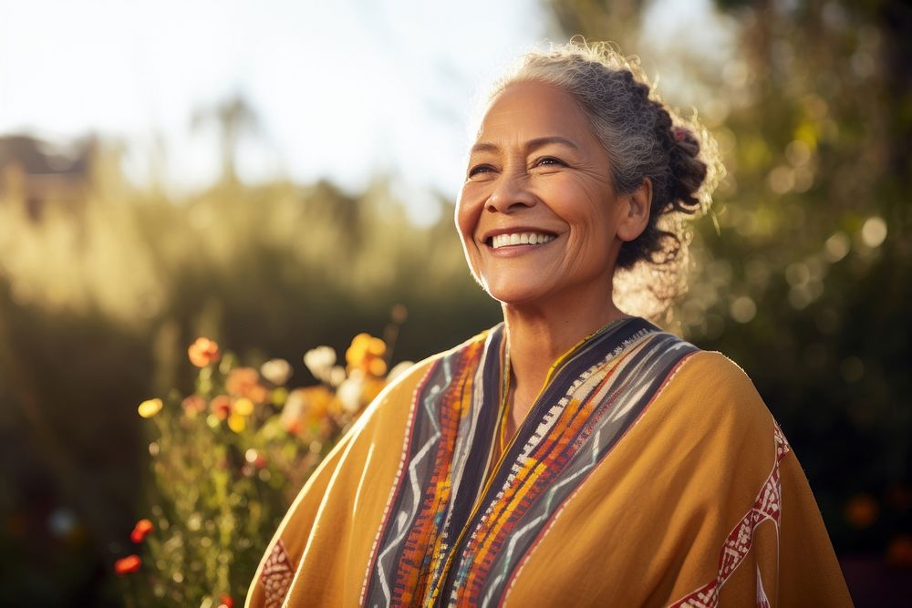 Middle aged native american woman smiling outdoors adult smile. AI generated Image by rawpixel.