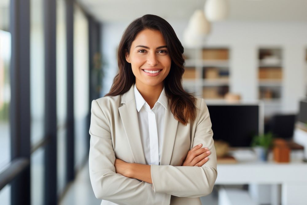 Native american business woman crossing arms smiling office adult. AI generated Image by rawpixel.