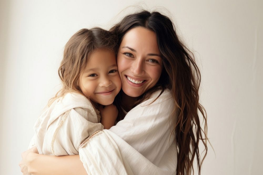 Native american mother and young daughter hugging portrait smiling adult. AI generated Image by rawpixel.