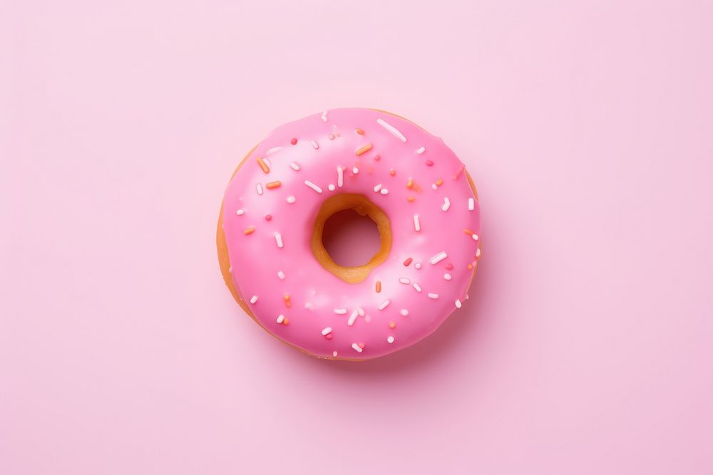 Pink donut food pink background confectionery. 