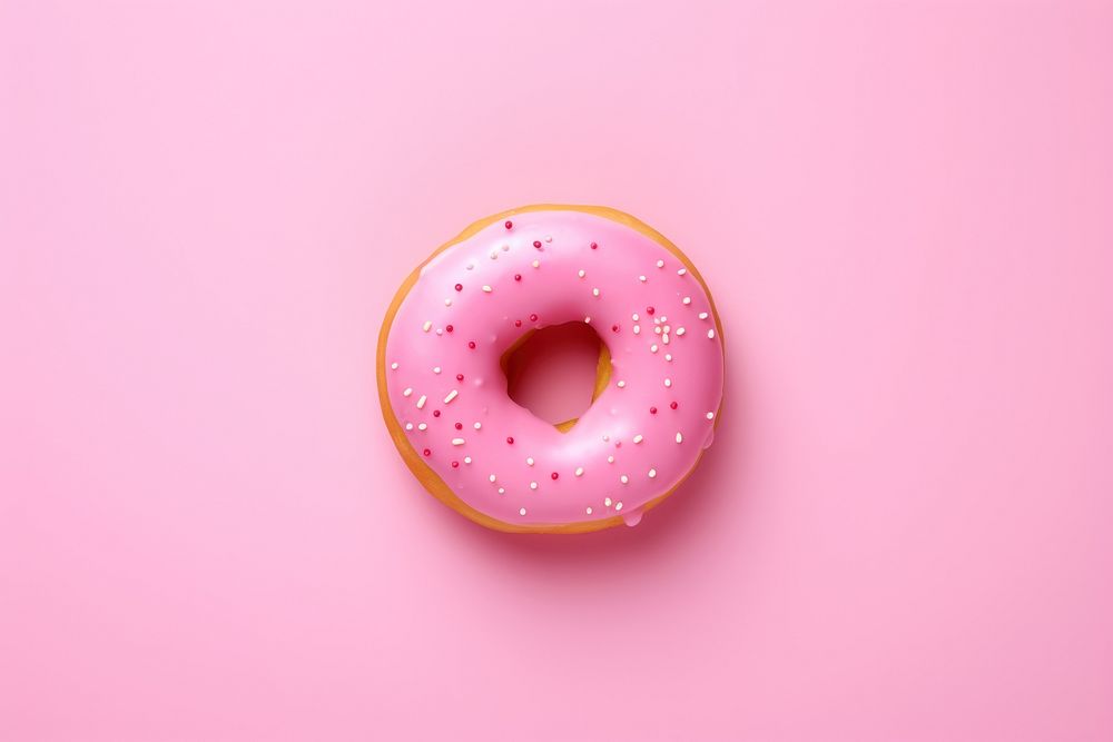 Pink donut food pink background confectionery. AI generated Image by rawpixel.