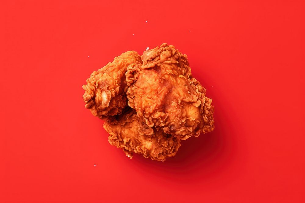 Fried chicken food red red background. AI generated Image by rawpixel.