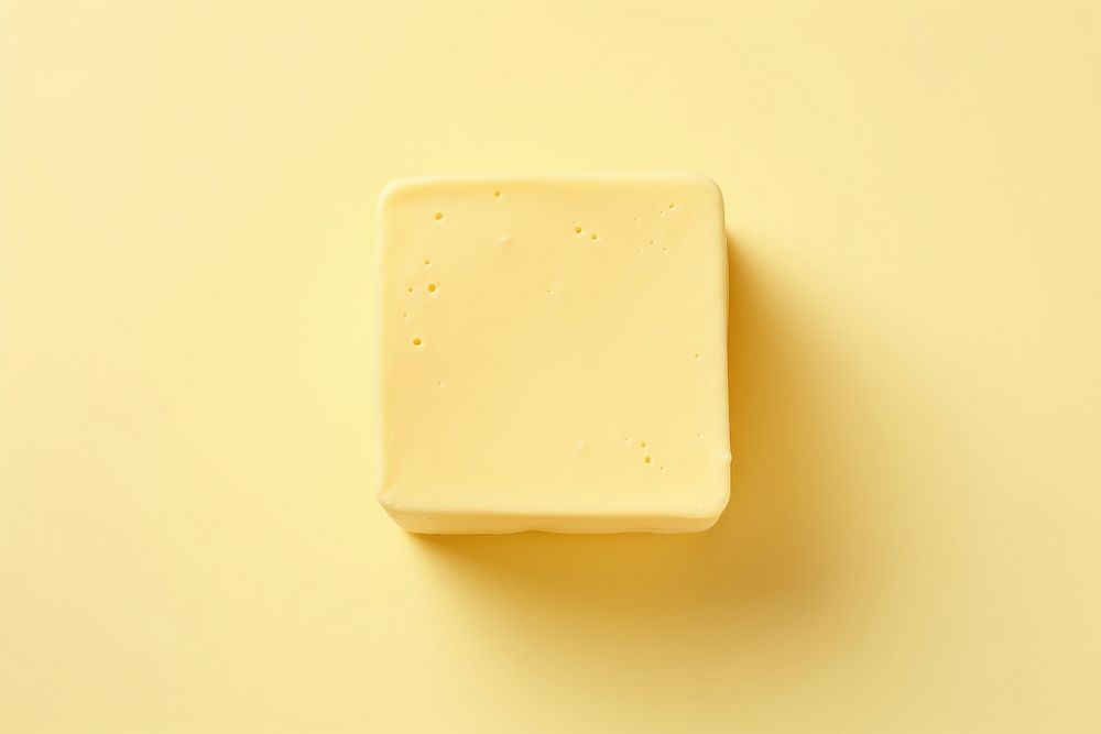 Yellow tofu food parmigiano-reggiano simplicity. AI generated Image by rawpixel.