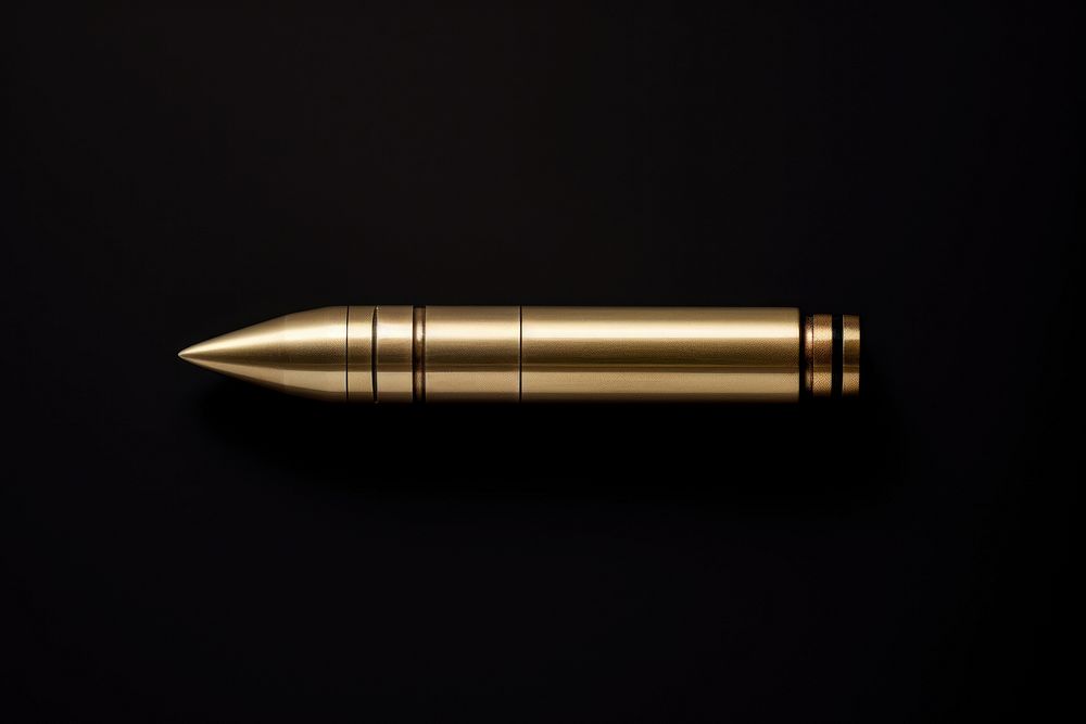 Brass bullet ammunition weapon simplicity. AI generated Image by rawpixel.