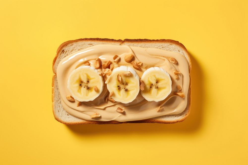 Sandwich with peanut butter and slice of bananas on top food breakfast freshness. AI generated Image by rawpixel.