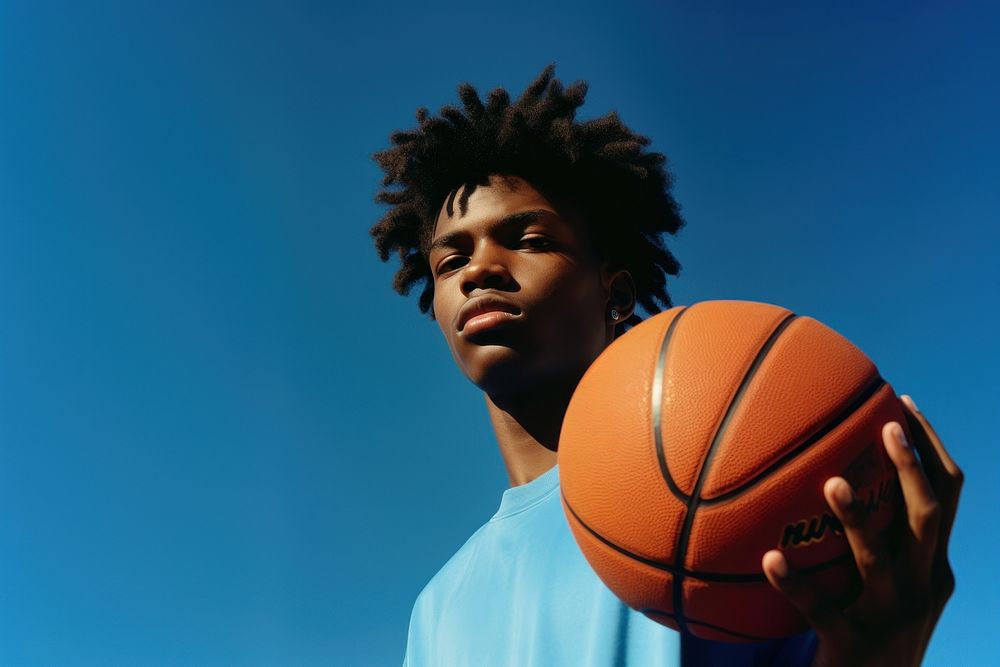 Black young man basketball sports blue. AI generated Image by rawpixel.