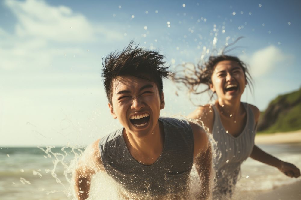 Asian friends splashing laughing outdoors. AI generated Image by rawpixel.