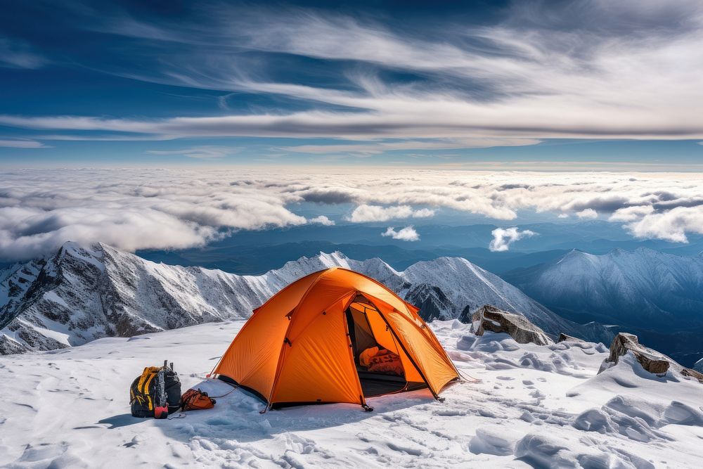 Tent on a snowy mountain summit recreation outdoors camping. AI generated Image by rawpixel.