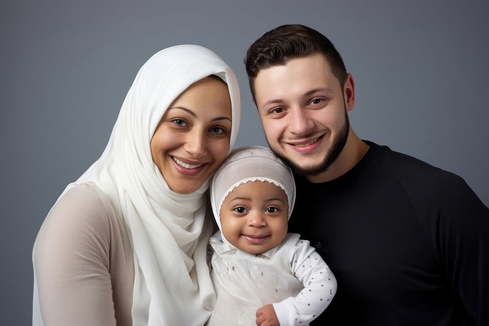 Young muslim couple with baby portrait smiling family. AI generated Image by rawpixel.