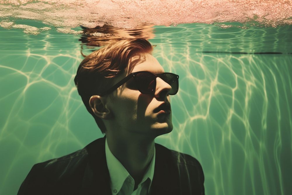 Young man swimming sunglasses portrait outdoors. AI generated Image by rawpixel.