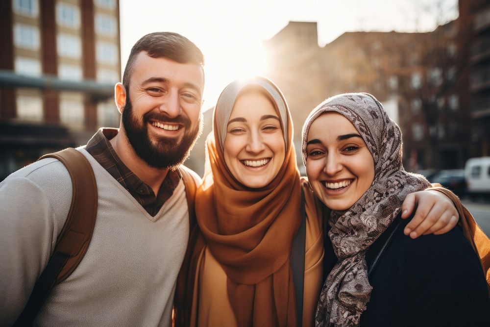 3 people in a Muslim family laughing smiling selfie. AI generated Image by rawpixel.