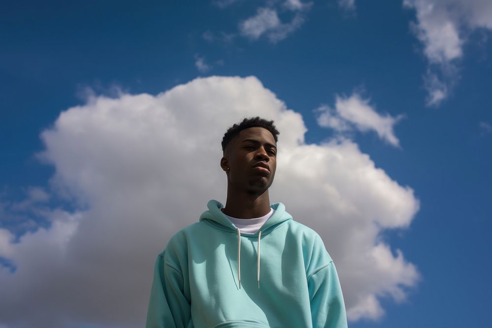 Black young man with basketball sky sweatshirt outdoors. AI generated Image by rawpixel.