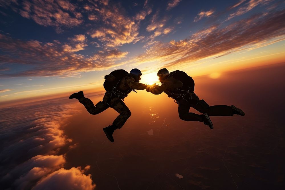 2 people skydiving adventure sunset adult. AI generated Image by rawpixel.