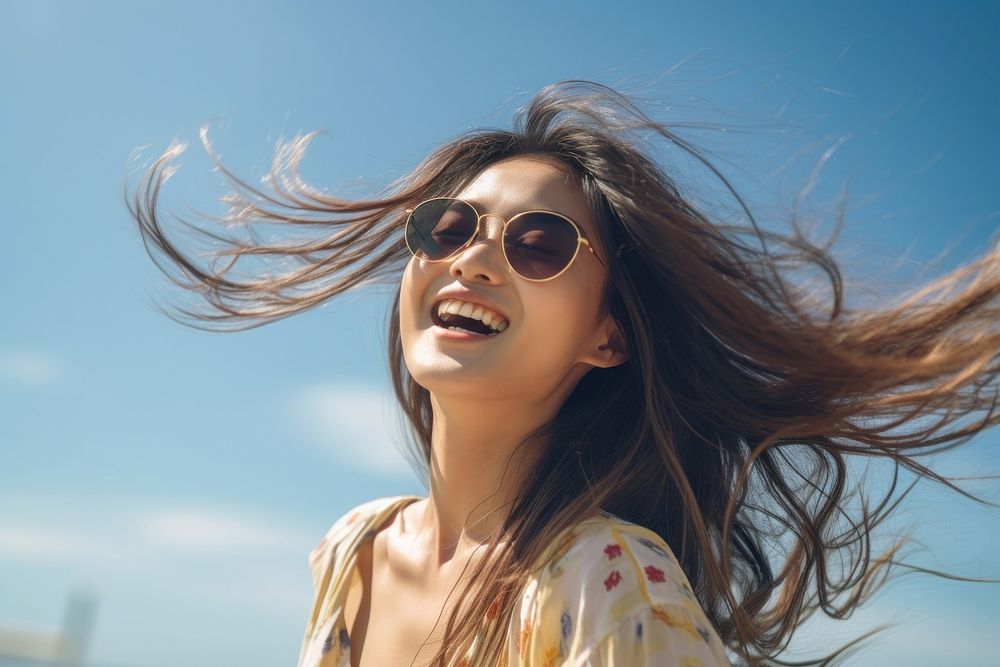 Smiling asian young woman sunglasses laughing smiling. AI generated Image by rawpixel.