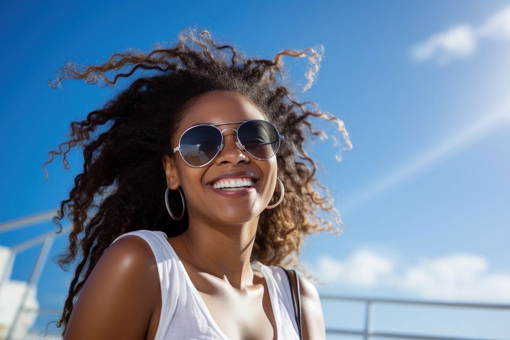 Smiling black young woman glasses sunglasses laughing. AI generated Image by rawpixel.