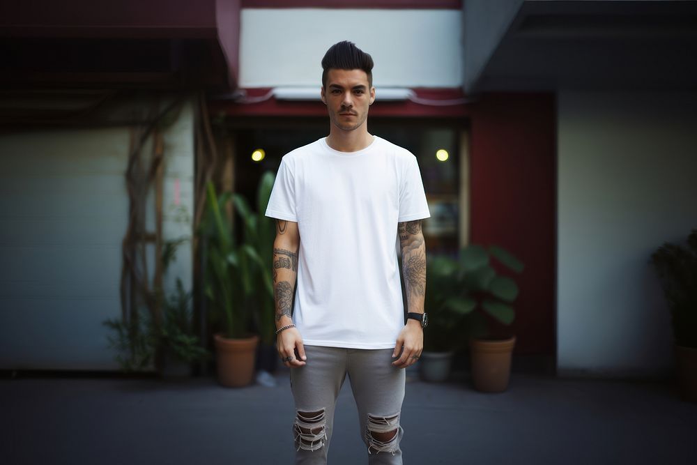A human wearing white tee t-shirt tattoo adult. AI generated Image by rawpixel.