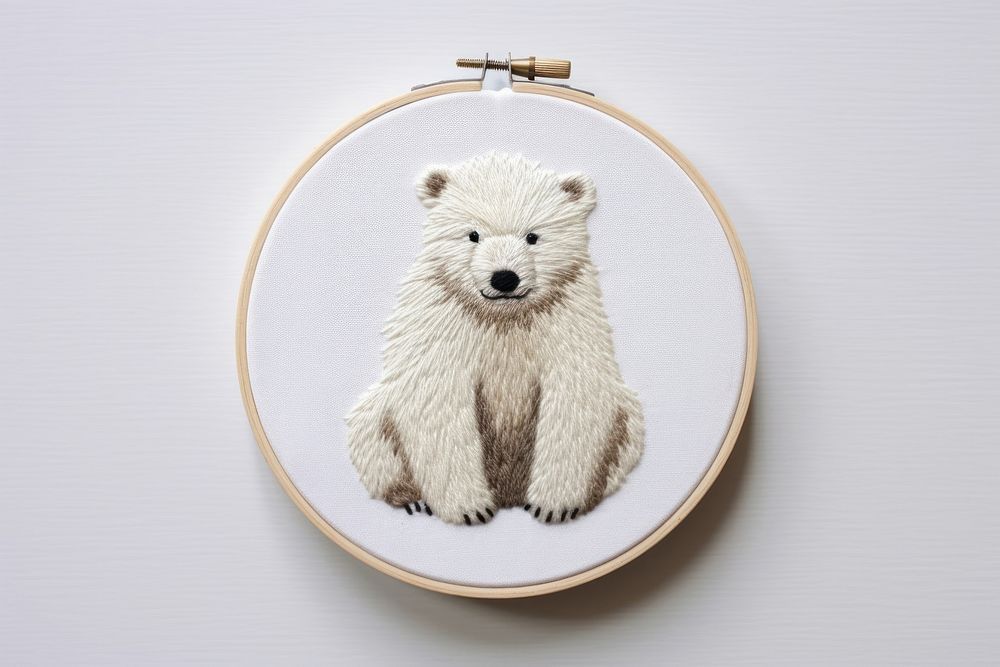 Polar bear sitting pattern embroidery textile. AI generated Image by rawpixel.
