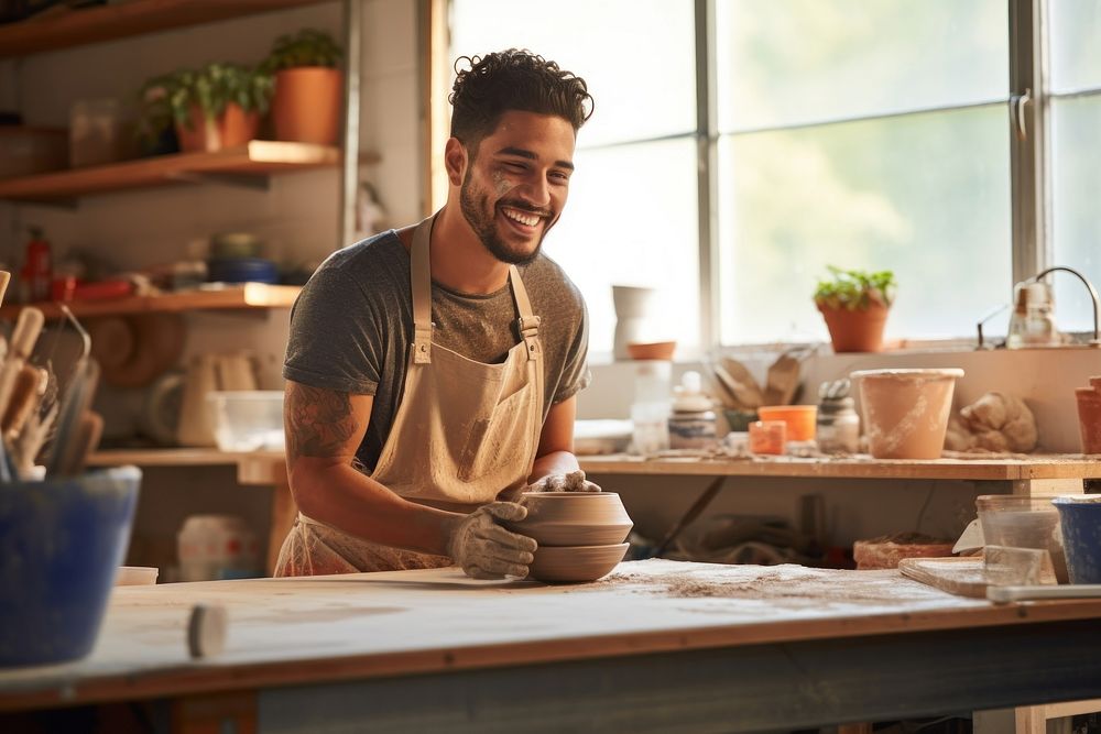 Young Latinx man pottery adult apron. AI generated Image by rawpixel.