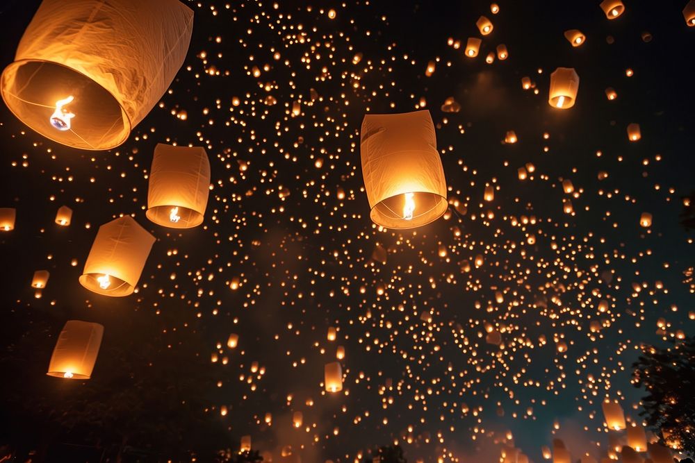 Sky lanterns in the night sky lighting illuminated celebration. AI generated Image by rawpixel.