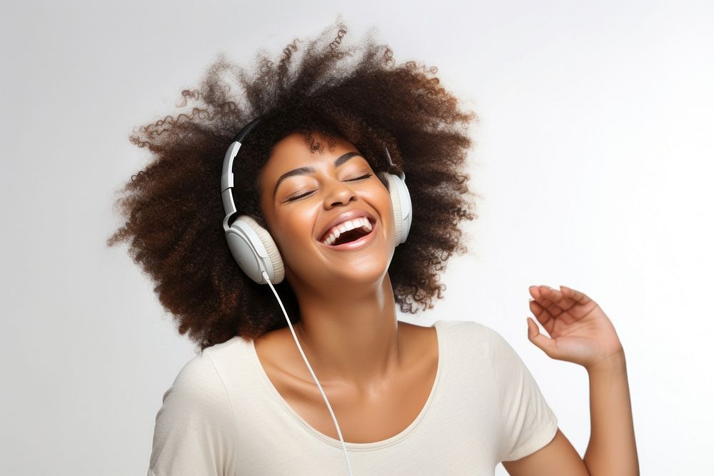 Listening to music headphones laughing headset. AI generated Image by rawpixel.