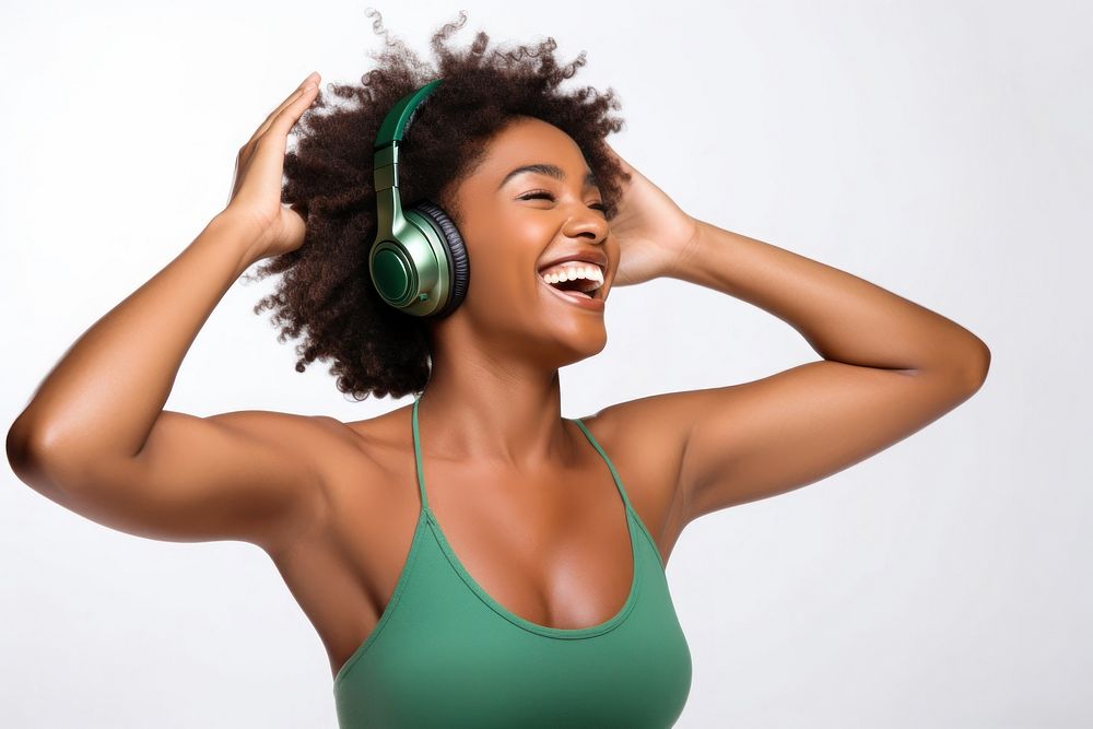Listening to music headphones laughing headset. AI generated Image by rawpixel.