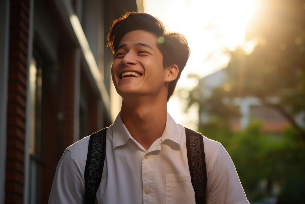 Southeast Asian student smile happy contemplation. AI generated Image by rawpixel.