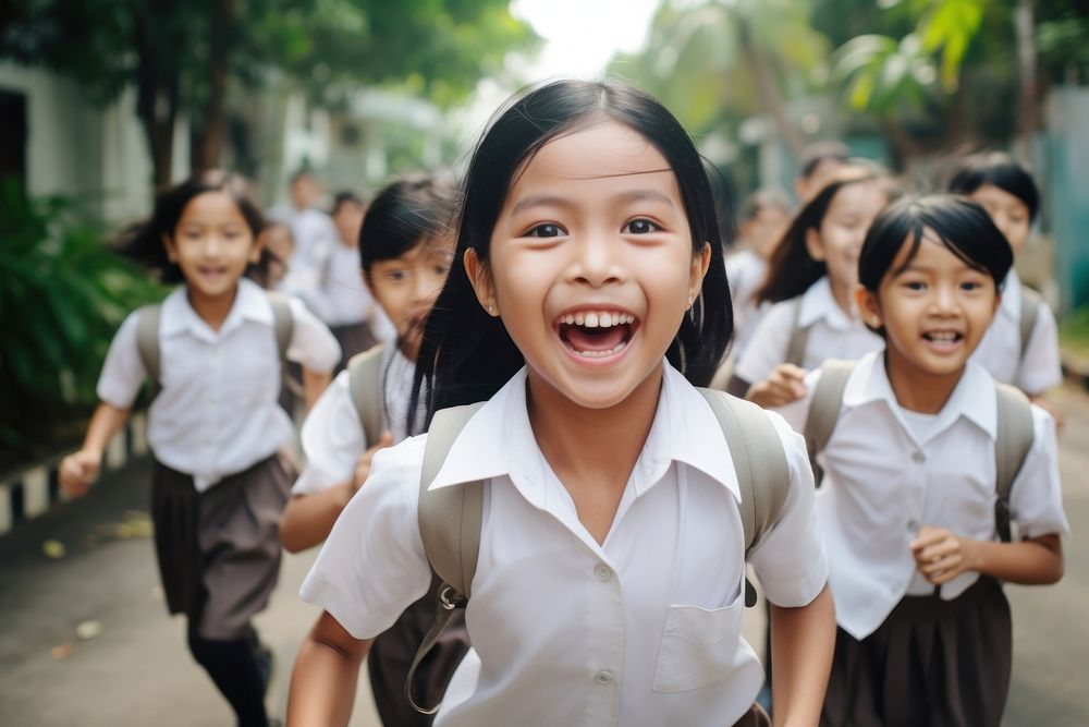 Southeast Asian students school adult smile. AI generated Image by rawpixel.
