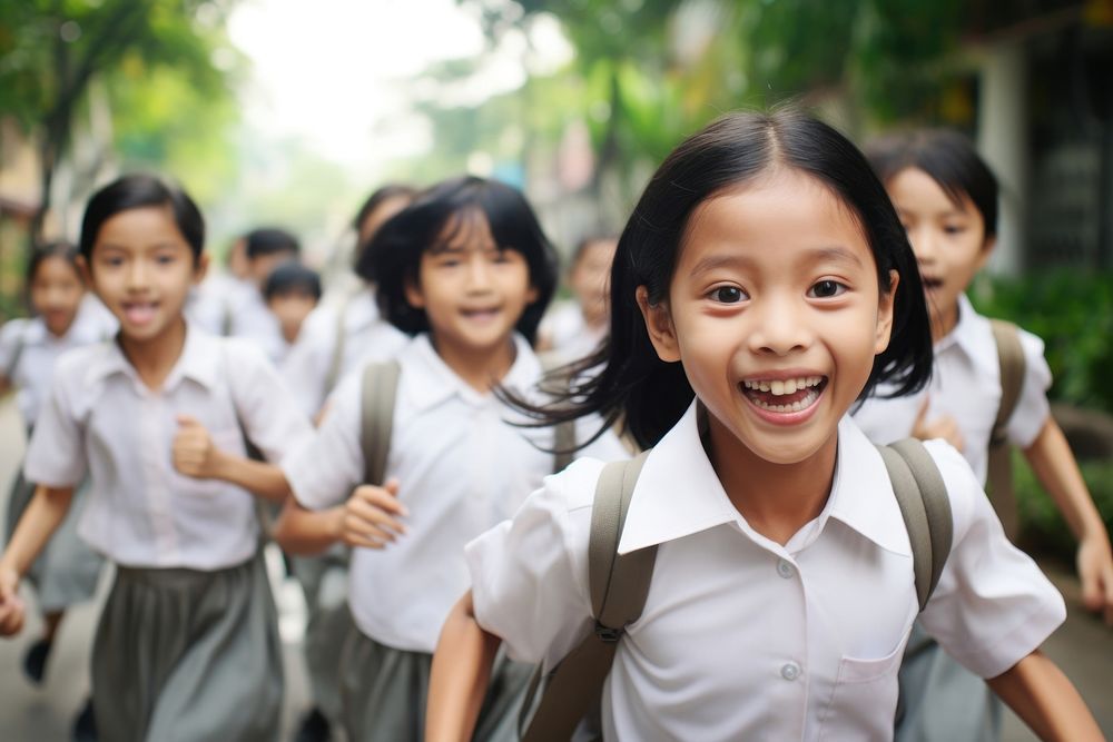 Southeast Asian students school smile happy. AI generated Image by rawpixel.