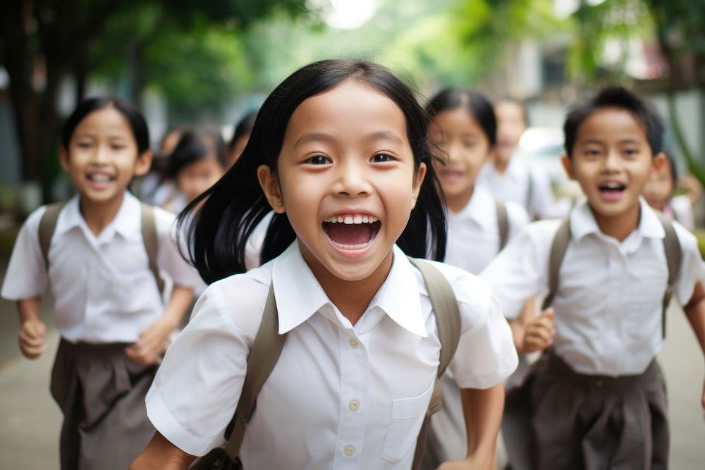 Southeast Asian students laughing school adult. AI generated Image by rawpixel.