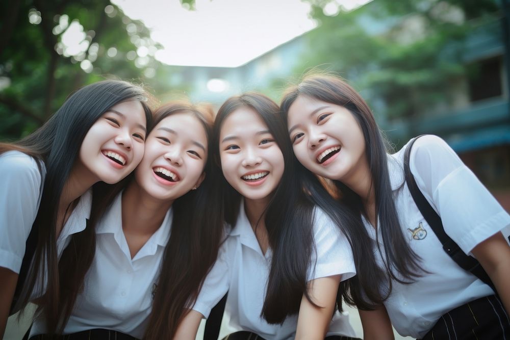 Southeast Asian students laughing school smile. AI generated Image by rawpixel.