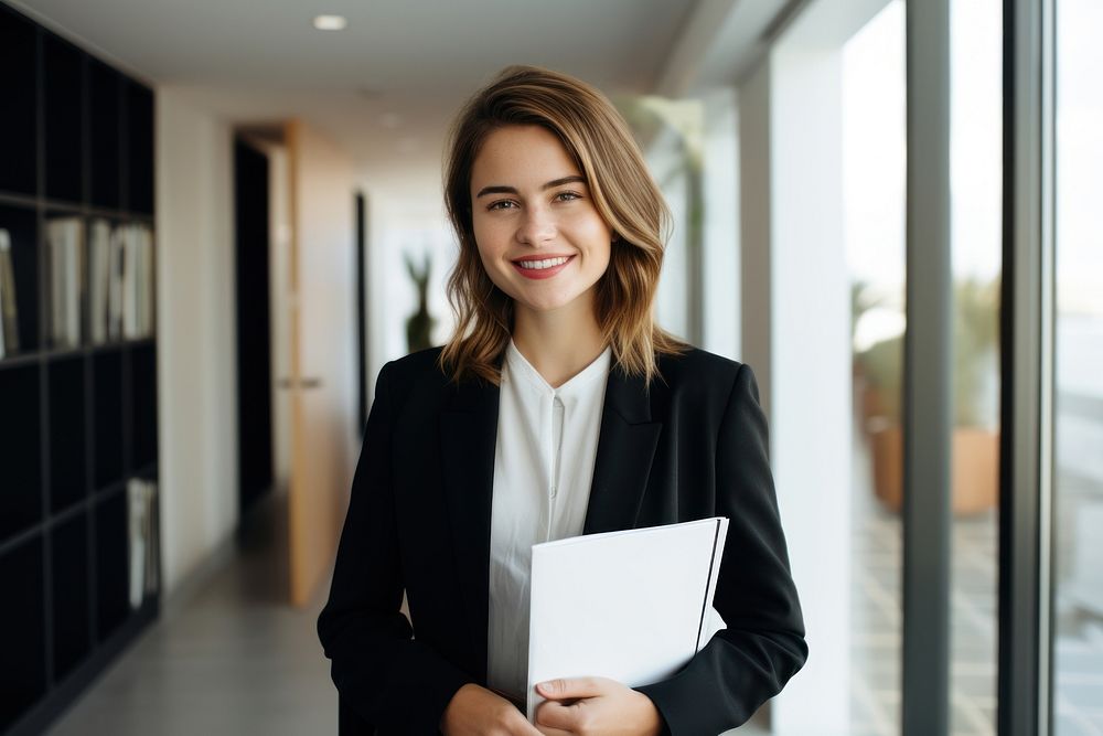 Saleswoman holding a file smiling adult smile. AI generated Image by rawpixel.