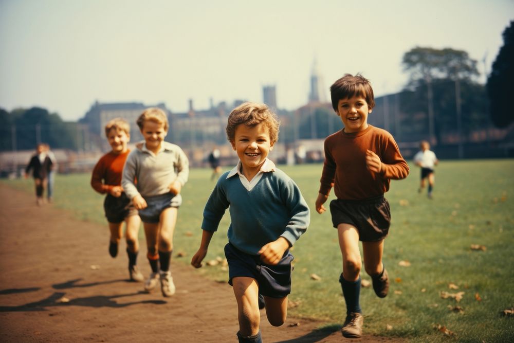 Children Exercising child exercising football. AI generated Image by rawpixel.