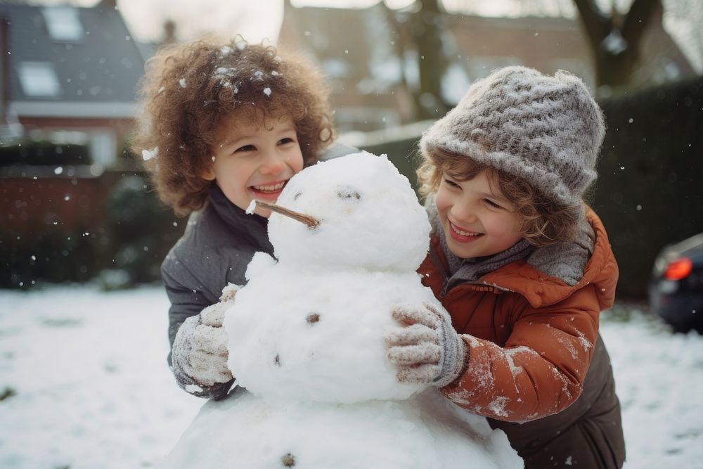 Children making a snowman portrait photography outdoors. AI generated Image by rawpixel.