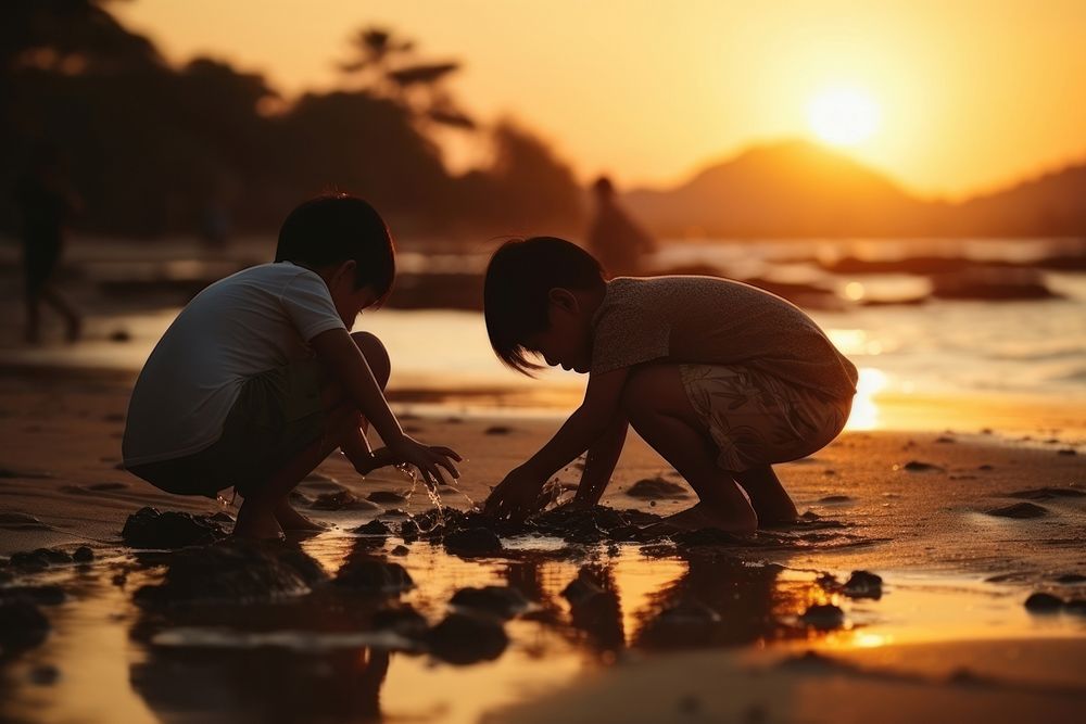 Thai children playing beach outdoors holiday. AI generated Image by rawpixel.