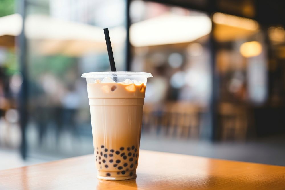 Bubble milk tea drink table cafe. AI generated Image by rawpixel.