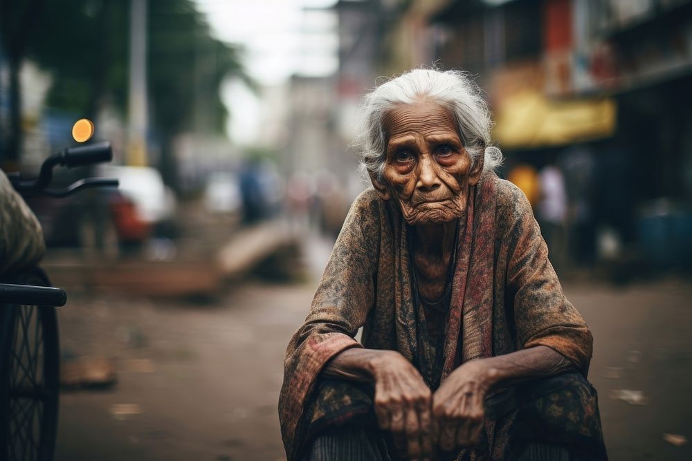 Senior lady sit and cry at street adult homelessness hopelessness. AI generated Image by rawpixel.