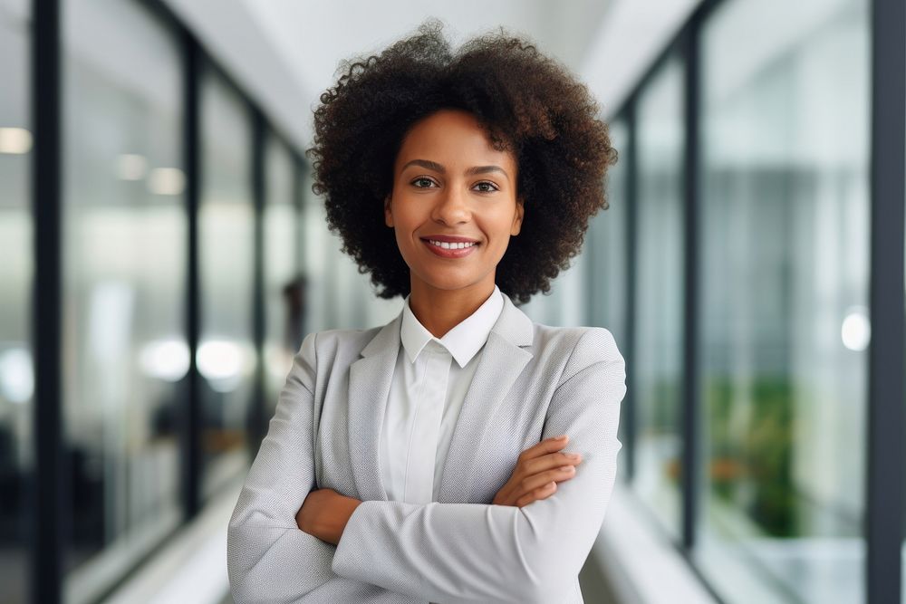African American woman in gray suit portrait smiling office. AI generated Image by rawpixel.