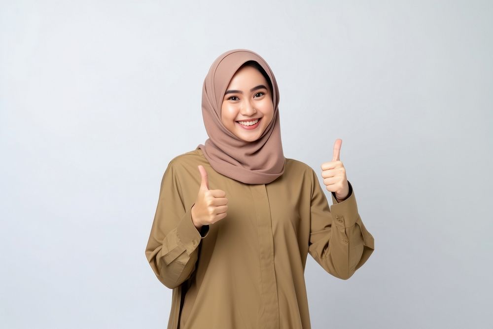 Indonesian smiling smile hijab. AI generated Image by rawpixel.