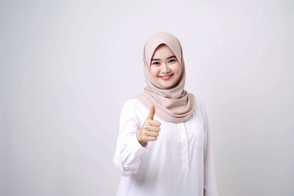 Indonesian smile hijab scarf. AI generated Image by rawpixel.