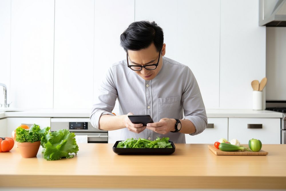 Asian man vegetable kitchen glasses. AI generated Image by rawpixel.