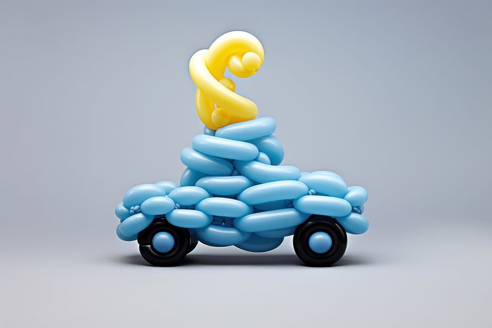 Car modelling balloon toy gray background representation. AI generated Image by rawpixel.