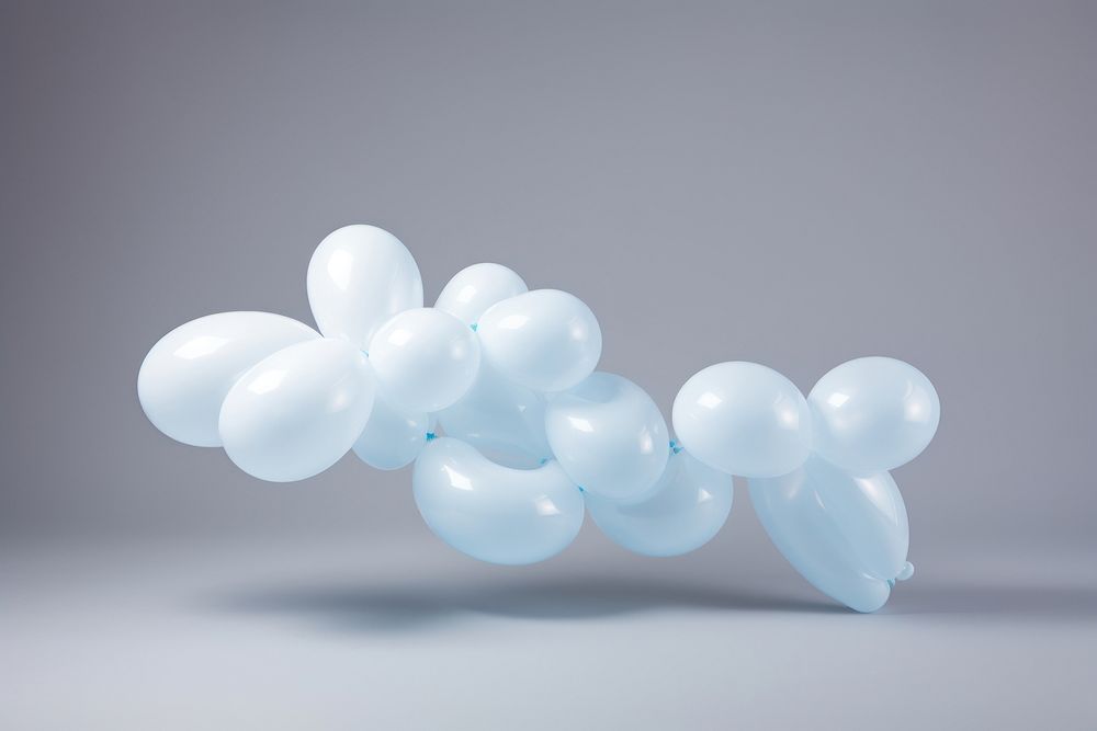 Balloon twisting gray background celebration decoration. AI generated Image by rawpixel.