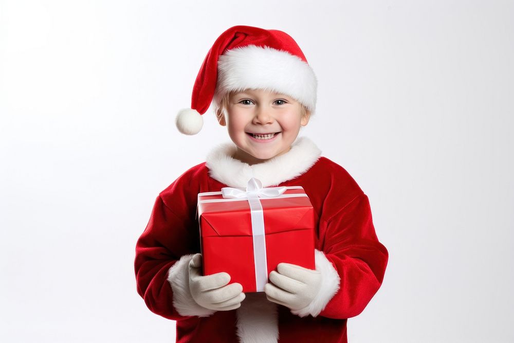 Santa kids christmas holding gift. AI generated Image by rawpixel.