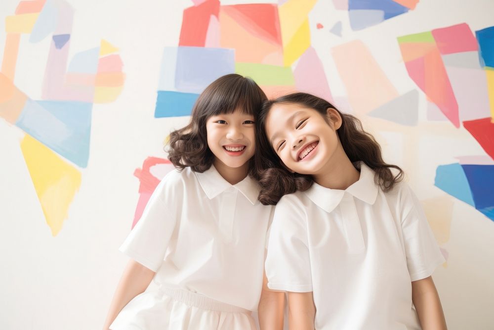 Photo of Singaporean girls in summer clothes playing together portrait family smile. AI generated Image by rawpixel.